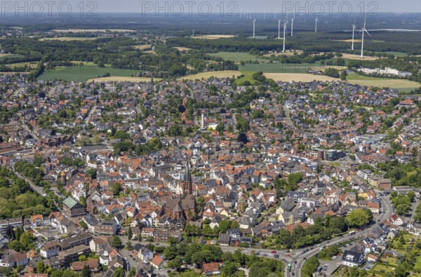 Aerial view, Old town with catholic St.Sixtus-Kirche, Altstadring, Haltern-Stadt, Haltern am See, Ruhr area, North Rhine-Westphalia, Germany, Old Town, Old Town view, Old Town area, Old Town ring road, Place of worship, DE, Europe, Religious community, Place of worship, Holy site, Church, Parish, Denomination, roundabout, roundabout, aerial view, aerial photography, aerial photography, religion, religious site, vertical view, overview, bird's-eye view, WEA, wind energy, wind energy plant, wind power, wind turbine, wind turbines, birds-eyes view, historic city centre, overview