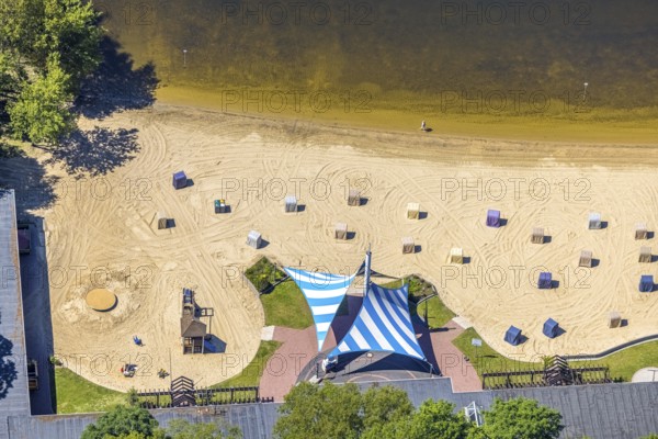Aerial view, preparation for the bathing season, Haltern reservoir, Haltern south beach with sandy beach, covered beach chairs and sun sails, Haltern town, Haltern am See, Ruhr area, North Rhine-Westphalia, Germany, DE, Europe, Gelsenwasser AG, aerial view, aerial photography, aerial photography, lake, reservoir, overview, bird's-eye view, Gelsenwasser AG waterworks, birds-eyes view, overview
