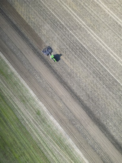 Field work, tractor, ploughing, cultivating, sowing peas, fertilising, agricultural work, harvesting, grain, field work with tractors, harvest festival, aerial view, agricultural machine, Saxony-Anhalt, Germany