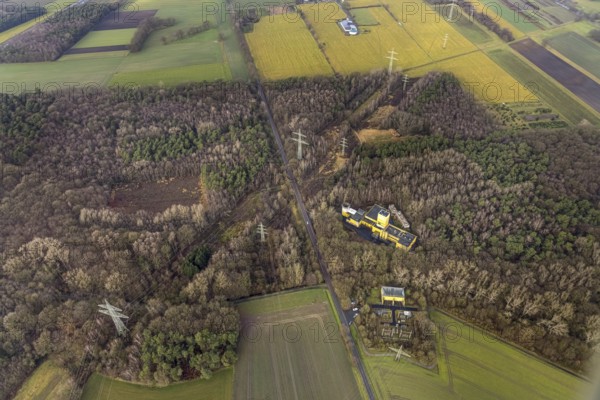 Aerial view of Ost Schacht Sandbochum mine in a forest area, steag substation Sandbochum, Kerstheider Straße in Hamm, Ruhr area, North Rhine-Westphalia, Germany, Ost colliery, DE, Europe, Hamm, Heinrich Robert Schacht Sandbochum, aerial view, aerial photography, aerial photography, aerial photography, Rhine-Ruhr metropolitan region, overview, substation, bird's eye view, forest area, birds-eyes view, former Ost colliery, overview