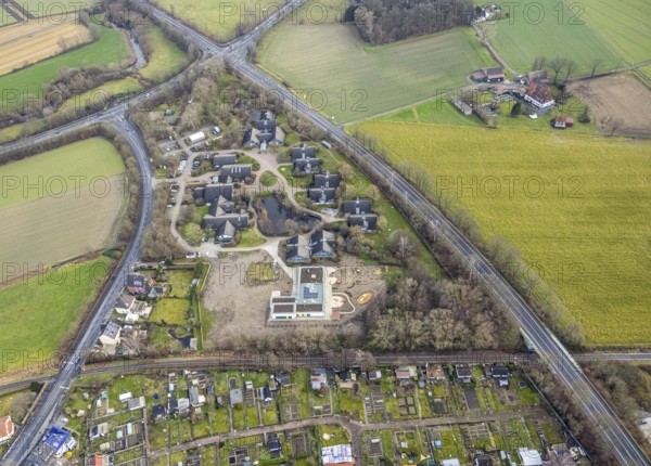 Aerial view of the AhsePark housing estate on Caldenhofer Weg with a new day care centre in Hamm, Ruhr area, North Rhine-Westphalia, Germany, Ahsestrolche, construction work, construction, construction vehicles, construction area, building site, building plots, construction crane, construction measure, construction project, construction site, DE, development, Europe, Hamm, real estate, capacity requirement, kindergarten, day-care centre, day-care facility, day-care centre, aerial photograph, aerial photography, aerial photography, Rhine-Ruhr metropolitan region, new building, overview, bird's-eye view, residential complex, residential area, residential buildings, residential quarter, housing estate, birds-eyes view, former Glunz village, overview