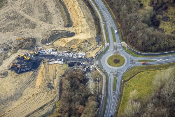 Construction area at Sachsenring with roundabout with housing estate in the district of Heessen in Hamm, Ruhr area, North Rhine-Westphalia, Germany, construction work, building, construction area, building site, building plots, construction project, construction site, DE, Europe, property tax, Hamm, real estate, roundabout, roundabout, aerial view, aerial photography, aerial photography, metropolitan region Rhine-Ruhr, new building, overview, bird's eye view, residential area, residential area, residential buildings, residential quality, residential neighbourhood, housing estate, birds-eyes view, overview