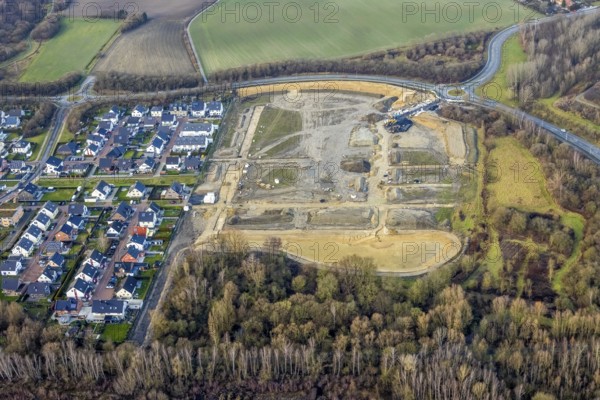 Construction area at Sachsenring with roundabout with housing estate in the district of Heessen in Hamm, Ruhr area, North Rhine-Westphalia, Germany, construction work, building, construction area, building site, building plots, construction project, construction site, DE, Europe, property tax, Hamm, real estate, roundabout, roundabout, aerial view, aerial photography, aerial photography, metropolitan region Rhine-Ruhr, new building, overview, bird's eye view, residential area, residential area, residential buildings, residential quality, residential neighbourhood, housing estate, birds-eyes view, overview