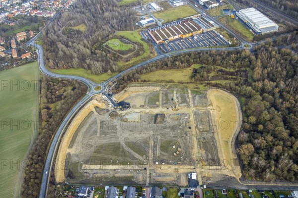 Construction area at Sachsenring with roundabout with housing estate in the district of Heessen in Hamm, Ruhr area, North Rhine-Westphalia, Germany, construction work, building, construction area, building site, building plots, construction project, construction site, DE, Europe, property tax, Hamm, real estate, roundabout, roundabout, aerial view, aerial photography, aerial photography, metropolitan region Rhine-Ruhr, new building, overview, bird's eye view, residential area, residential area, residential buildings, residential quality, residential neighbourhood, housing estate, birds-eyes view, overview