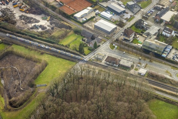 Aerial view S-Bahn at level crossing at Hamm-Bockum-Hövel station in Hamm, Ruhr area, North Rhine-Westphalia, Germany, railway tracks, railway station, DE, Deutsche Bahn AG, Europe, railway tracks, Hamm, aerial view, aerial photograph, aerial photography, aerial photography, Rhine-Ruhr metropolitan region, overview, bird's-eye view, bird's-eye view, overview