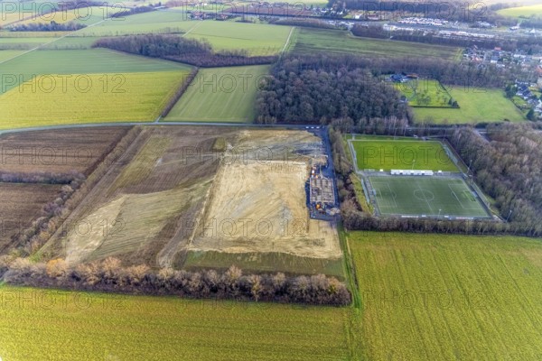 Aerial view open space and construction site football pitch club grounds of SV Westfalia Rhynern An der Lohschule in Hamm, Ruhr area, North Rhine-Westphalia, Germany, construction work, construction, construction area, construction site, building plots, construction project, construction site, DE, Europe, football pitch, Hamm, aerial view, aerial photograph, aerial photography, aerial photography, Rhine-Ruhr metropolitan region, new construction, sports field, overview, bird's-eye view, overview