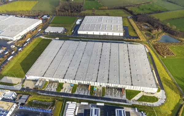 Aerial view southern extension of Rhynern industrial estate in Hamm, Ruhr area, North Rhine-Westphalia, Germany, DE, Europe, commercial enterprises, commercial area, commercial park, commercial location, commercial use, Hamm, industrial area, industrial building, industrial location, aerial view, aerial photograph, aerial photography, aerial photography, Rhine-Ruhr metropolitan region, Oberster Kamp, overview, bird's-eye view, overview, Hellweg HBL - Hamm Logistics Centre
