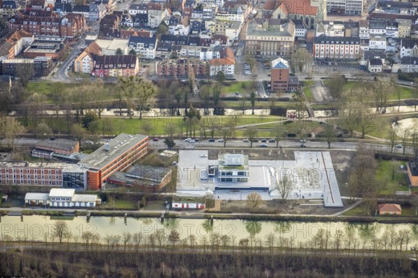 Aerial view construction area new water sports centre on Adenauerallee at Hammonense grammar school with transition to Nordring and Hans-Böckler-Platz in Hamm, Ruhr area, North Rhine-Westphalia, Germany, construction work, construction vehicles, construction area, construction site, building plots, construction crane, construction measure, construction project, construction site, education, educational institution, DE, Datteln-Hamm Canal, development, Europe, river Lippe, business park, grammar school, Hamm, industrial area, canal edge, educational institute, aerial view, aerial photograph, aerial photography, aerial photography, Rhine-Ruhr metropolitan region, new building, shipping, school, overview, bird's-eye view, overview