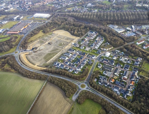 Construction area at Sachsenring with housing estate in the district of Heessen in Hamm, Ruhr area, North Rhine-Westphalia, Germany, construction work, building, construction area, building site, building plots, construction project, construction site, DE, Europe, property tax, Hamm, real estate, roundabout, roundabout, aerial view, aerial photograph, aerial photography, aerial photography, Rhine-Ruhr metropolitan region, new construction, overview, bird's-eye view, residential complex, living and living, residential area, residential buildings, residential quality, residential quarter, housing estate, birds-eyes view, overview