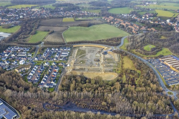 Construction area at Sachsenring with housing estate in the district of Heessen in Hamm, Ruhr area, North Rhine-Westphalia, Germany, construction work, building, construction area, building site, building plots, construction project, construction site, DE, Europe, property tax, Hamm, real estate, roundabout, roundabout, aerial view, aerial photograph, aerial photography, aerial photography, Rhine-Ruhr metropolitan region, new construction, overview, bird's-eye view, residential complex, living and living, residential area, residential buildings, residential quality, residential quarter, housing estate, birds-eyes view, overview