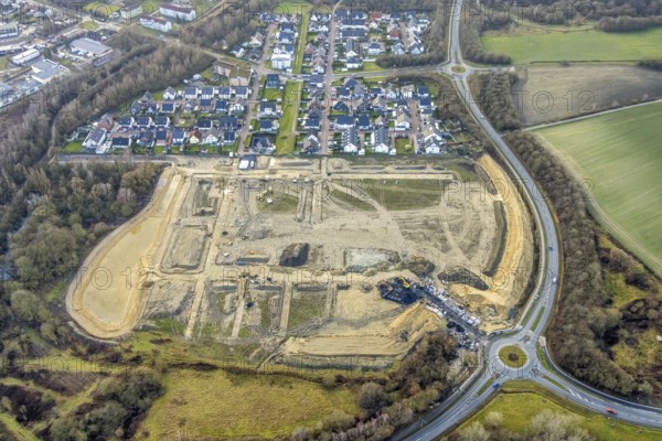 Construction area at Sachsenring with roundabout with housing estate in the district of Heessen in Hamm, Ruhr area, North Rhine-Westphalia, Germany, construction work, building, construction area, building site, building plots, construction project, construction site, DE, Europe, property tax, Hamm, real estate, roundabout, roundabout, aerial view, aerial photography, aerial photography, metropolitan region Rhine-Ruhr, new building, overview, bird's eye view, residential area, residential area, residential buildings, residential quality, residential neighbourhood, housing estate, birds-eyes view, overview