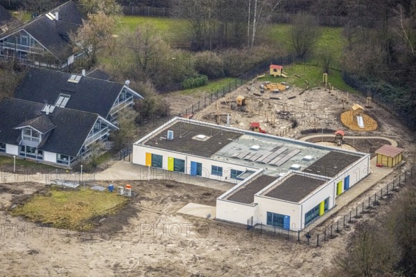 Aerial view of the AhsePark housing estate on Caldenhofer Weg with a new day care centre in Hamm, Ruhr area, North Rhine-Westphalia, Germany, Ahsestrolche, construction work, construction, construction vehicles, construction area, building site, building plots, construction crane, construction measure, construction project, construction site, DE, development, Europe, Hamm, real estate, capacity requirement, kindergarten, day-care centre, day-care facility, day-care centre, aerial photograph, aerial photography, aerial photography, Rhine-Ruhr metropolitan region, new building, overview, bird's-eye view, residential complex, residential area, residential buildings, residential quarter, housing estate, birds-eyes view, former Glunz village, overview