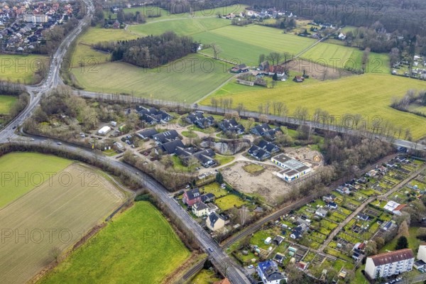 Aerial view of the AhsePark housing estate on Caldenhofer Weg with a new day care centre in Hamm, Ruhr area, North Rhine-Westphalia, Germany, Ahsestrolche, construction work, construction, construction vehicles, construction area, building site, building plots, construction crane, construction measure, construction project, construction site, DE, development, Europe, Hamm, real estate, capacity requirement, kindergarten, day-care centre, day-care facility, day-care centre, aerial photograph, aerial photography, aerial photography, Rhine-Ruhr metropolitan region, new building, overview, bird's-eye view, residential complex, residential area, residential buildings, residential quarter, housing estate, birds-eyes view, former Glunz village, overview