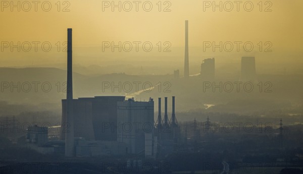 Aerial view of RWE Power AG power plant Gersteinwerk in backlight and STEAG power plant Bergkamen at the Datteln-Hamm canal in Hamm, Ruhr area, North Rhine-Westphalia, Germany, DE, steam power plant, energy, energy supplier, energy industry, Europe, commercial enterprises, commercial area, commercial park, commercial location, commercial use, Hamm, Hammer Straße, industrial plants, industrial area, industrial building, industrial location, chimney, power plant, cooling towers, aerial view, aerial photograph, aerial photography, aerial photography, Rhine-Ruhr metropolitan region, overview, bird's-eye view, birds-eyes view, overview