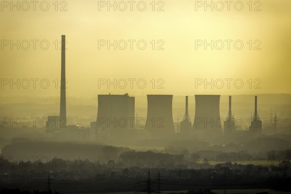 Aerial view of RWE Power AG power plant Gersteinwerk in backlight in Hamm, Ruhr area, North Rhine-Westphalia, Germany, DE, steam power plant, energy, energy supplier, energy industry, Europe, commercial enterprises, commercial area, commercial park, commercial location, commercial use, Hamm, Hammer Straße, industrial plants, industrial area, industrial building, industrial site, chimney, power plant, cooling towers, aerial view, aerial photograph, aerial photography, aerial photography, Rhine-Ruhr metropolitan region, overview, bird's eye view, birds-eyes view, overview