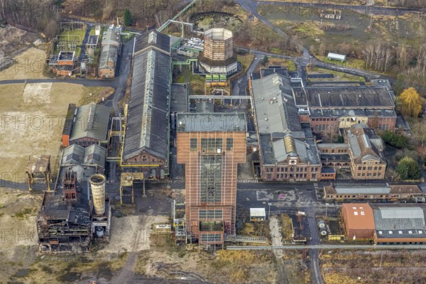 Aerial view with hammerhead tower in Ost Zeche Heinrich Robert colliery, CreativRevier in Wiescherhöfen, Hamm, Ruhr area, North Rhine-Westphalia, Germany, mine, Heinrich Robert colliery, DE, Europe, commercial enterprises, commercial area, commercial park, commercial location, commercial use, industrial plants, industrial area, industrial building, industrial site, aerial view, aerial photograph, aerial photography, aerial photography, Rhine-Ruhr metropolitan region, coal mine, tower, overview, bird's-eye view, birds-eyes view, former Ost colliery, historical, historical site, overview, destroyed building