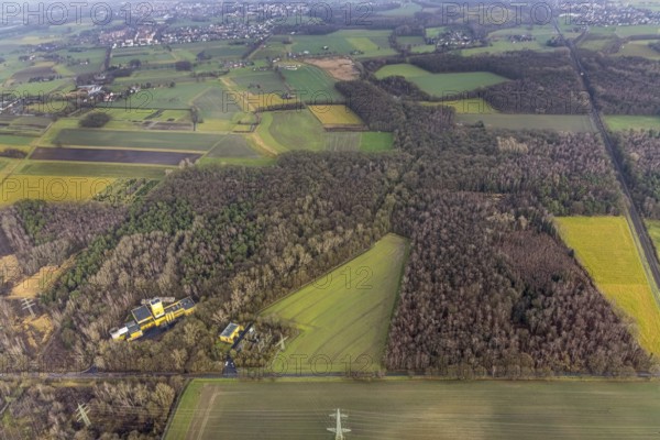Aerial view of Ost Schacht Sandbochum mine in a forest area, steag substation Sandbochum, Kerstheider Straße in Hamm, Ruhr area, North Rhine-Westphalia, Germany, Ost colliery, DE, Europe, Hamm, Heinrich Robert Schacht Sandbochum, aerial view, aerial photography, aerial photography, aerial photography, Rhine-Ruhr metropolitan region, overview, substation, bird's eye view, forest area, birds-eyes view, former Ost colliery, overview