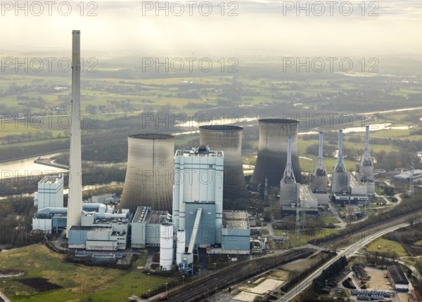 Aerial view of RWE Power AG power plant Gersteinwerk, Hamm, Ruhr area, North Rhine-Westphalia, Germany, DE, steam power plant, energy, energy supplier, energy industry, Europe, commercial enterprises, commercial area, commercial park, commercial location, commercial use, Hammer Straße, industrial plants, industrial area, industrial building, industrial location, chimney, power plant, cooling towers, aerial view, aerial photograph, aerial photography, aerial photography, Rhine-Ruhr metropolitan region, overview, bird's-eye view, birds-eyes view, overview