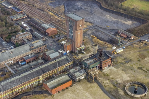 Aerial view with hammerhead tower in Ost Zeche Heinrich Robert colliery, CreativRevier in Wiescherhöfen, Hamm, Ruhr area, North Rhine-Westphalia, Germany, mine, Heinrich Robert colliery, DE, Europe, commercial enterprises, commercial area, commercial park, commercial location, commercial use, industrial plants, industrial area, industrial building, industrial site, aerial view, aerial photograph, aerial photography, aerial photography, Rhine-Ruhr metropolitan region, coal mine, tower, overview, bird's-eye view, birds-eyes view, former Ost colliery, historical, historical site, overview, destroyed building