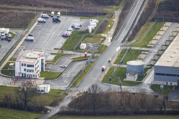 Aerial view of the road narrowing for trucks at the DPD Hamm Depot 0159 and administration building in Hamm, Ruhr area, North Rhine-Westphalia, Germany, DE, Europe, freight transport, Hamm, logistics, logistics service, logistics provider, logistics centre, aerial view, aerial photography, aerial photography, aerial photography, Rhine-Ruhr metropolitan region, Osterbönener Weg, parcel centre, freight forwarding, overview, shipping service, bird's eye view, overview