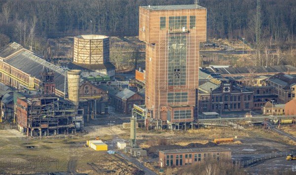 Aerial view with hammerhead tower at Ost Zeche Heinrich Robert colliery, CreativRevier in Wiescherhöfen, Hamm, Ruhr area, North Rhine-Westphalia, Germany, mine, Heinrich Robert colliery, DE, Europe, commercial enterprises, commercial area, commercial park, commercial location, commercial use, industrial facilities, industrial area, industrial building, industrial site, aerial view, aerial photograph, aerial photography, aerial photography, Rhine-Ruhr metropolitan region, coal mine, tower, overview, bird's-eye view, birds-eyes view, former Ost colliery, historical, historical site, overview, destroyed building