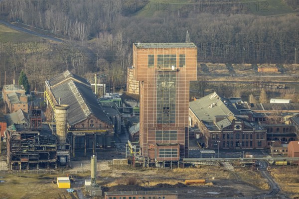 Aerial view with hammerhead tower at Ost Zeche Heinrich Robert colliery, CreativRevier in Wiescherhöfen, Hamm, Ruhr area, North Rhine-Westphalia, Germany, mine, Heinrich Robert colliery, DE, Europe, commercial enterprises, commercial area, commercial park, commercial location, commercial use, industrial facilities, industrial area, industrial building, industrial site, aerial view, aerial photograph, aerial photography, aerial photography, Rhine-Ruhr metropolitan region, coal mine, tower, overview, bird's-eye view, birds-eyes view, former Ost colliery, historical, historical site, overview, destroyed building