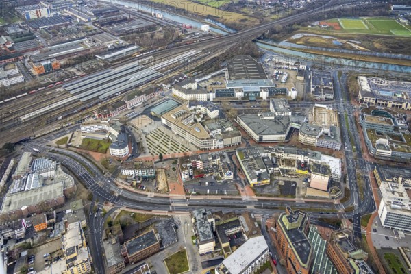 Aerial view city centre view commercial buildings Bahnhofstraße in Hamm, Ruhr area, North Rhine-Westphalia, Germany, railway tracks, railway station, federal road B63, City, DE, Deutsche Bahn AG, Europe, commercial buildings, railway tracks, Hamm, main station, main station Hamm, central station, city centre, aerial view, aerial photograph, aerial photography, aerial photography, Rhine-Ruhr metropolitan region, city centre, overview, bird's eye view, birds-eyes view, overview