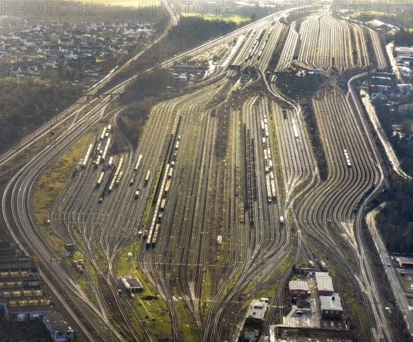Aerial view shunting yard and freight yard in backlight in Hamm, Ruhr area, North Rhine-Westphalia, Germany, railway tracks, railway station, DE, Deutsche Bahn AG, Europe, backlight, railway tracks, Hamm, aerial view, aerial photograph, aerial photography, aerial photography, Rhine-Ruhr metropolitan region, overview, bird's eye view, birds-eyes view, former signal box, overview