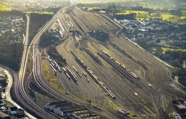 Aerial view shunting yard and freight yard in backlight in Hamm, Ruhr area, North Rhine-Westphalia, Germany, railway tracks, railway station, DE, Deutsche Bahn AG, Europe, backlight, railway tracks, Hamm, aerial view, aerial photograph, aerial photography, aerial photography, Rhine-Ruhr metropolitan region, overview, bird's eye view, birds-eyes view, former signal box, overview