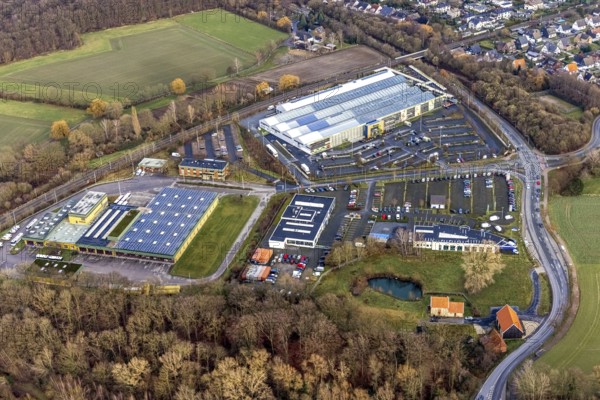 Aerial view commercial area mountains with transport company Hamm, Auto Zentrum Dr. Mertens, garden centre Hesse, Rhynern, Hamm, Ruhr area, North Rhine-Westphalia, Germany, railway tracks, DE, Europe, commercial enterprises, commercial area, commercial area, commercial park, commercial location, commercial use, industrial area, industrial building, industrial location, Kampshege, aerial view, aerial photograph, aerial photography, aerial photography, Rhine-Ruhr metropolitan region, overview, bird's eye view, birds-eyes view, overview