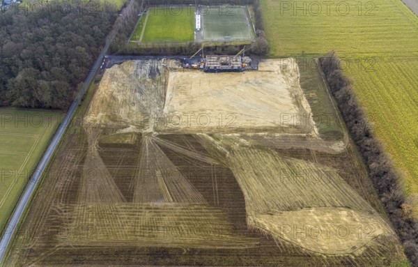Aerial view open space and construction site football pitch club grounds of SV Westfalia Rhynern An der Lohschule in Hamm, Ruhr area, North Rhine-Westphalia, Germany, construction work, construction, construction area, construction site, building plots, construction project, construction site, DE, Europe, football pitch, Hamm, aerial view, aerial photograph, aerial photography, aerial photography, Rhine-Ruhr metropolitan region, new construction, sports field, overview, bird's-eye view, overview