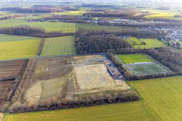 Aerial view open space and construction site football pitch club grounds of SV Westfalia Rhynern An der Lohschule in Hamm, Ruhr area, North Rhine-Westphalia, Germany, construction work, construction, construction area, construction site, building plots, construction project, construction site, DE, Europe, football pitch, Hamm, aerial view, aerial photograph, aerial photography, aerial photography, Rhine-Ruhr metropolitan region, new construction, sports field, overview, bird's-eye view, overview