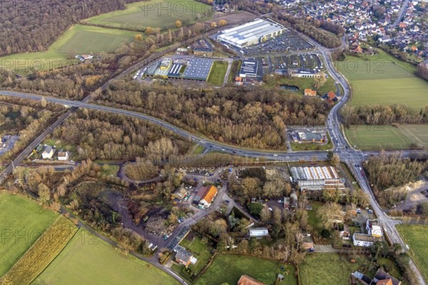 Aerial view commercial area mountains with transport company Hamm, Auto Zentrum Dr. Mertens, garden centre Hesse, Rhynern, Hamm, Ruhr area, North Rhine-Westphalia, Germany, railway tracks, DE, Europe, commercial enterprises, commercial area, commercial area, commercial park, commercial location, commercial use, industrial area, industrial building, industrial location, Kampshege, aerial view, aerial photograph, aerial photography, aerial photography, Rhine-Ruhr metropolitan region, overview, bird's eye view, birds-eyes view, overview