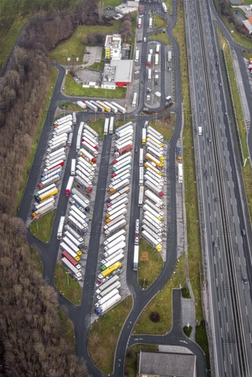 Aerial view motorway service area Rhynern-Nord and Rhynern-Süd on the A2 motorway, truck parking, Hamm, Ruhr area, North Rhine-Westphalia, Germany, A2 motorway, DE, Europe, shapes and colours, freight traffic, logistics, aerial view, aerial photograph, aerial photography, aerial photography, Rhine-Ruhr metropolitan region, parking spaces, service area, service area, transport, overview, bird's-eye view, bird's-eye view, overview