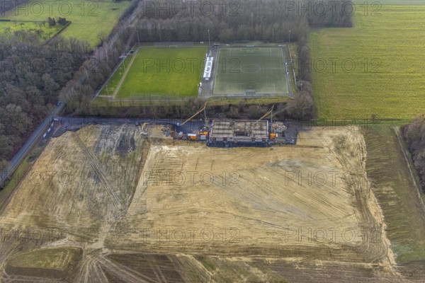 Aerial view open space and construction site football pitch club grounds of SV Westfalia Rhynern An der Lohschule in Hamm, Ruhr area, North Rhine-Westphalia, Germany, construction work, construction, construction area, construction site, building plots, construction project, construction site, DE, Europe, football pitch, Hamm, aerial view, aerial photograph, aerial photography, aerial photography, Rhine-Ruhr metropolitan region, new construction, sports field, overview, bird's-eye view, overview