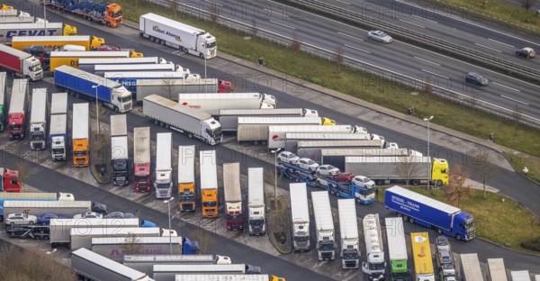 Aerial view motorway service area Rhynern-Nord and Rhynern-Süd on the A2 motorway, truck parking, Hamm, Ruhr area, North Rhine-Westphalia, Germany, A2 motorway, DE, Europe, shapes and colours, freight traffic, logistics, aerial view, aerial photograph, aerial photography, aerial photography, Rhine-Ruhr metropolitan region, parking spaces, service area, service area, transport, overview, bird's-eye view, bird's-eye view, overview