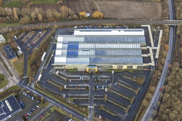Aerial view commercial area mountains with garden centre Hesse, Rhynern, Hamm, Ruhr area, North Rhine-Westphalia, Germany, railway tracks, DE, Europe, commercial enterprises, commercial area, commercial park, commercial location, commercial use, industrial area, industrial building, industrial location, Kampshege, aerial view, aerial photograph, aerial photography, aerial photography, Rhine-Ruhr metropolitan region, overview, bird's-eye view, bird's-eye view, overview