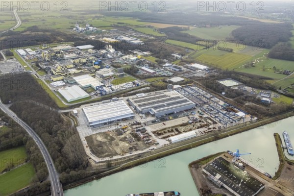 Aerial photo Goldbeck Betonelemente am Datteln-Hamm-Kanal and DuPont with DuBay Polymer GmbH in Hamm, Ruhr area, North Rhine-Westphalia, Germany, DE, Datteln-Hamm-Kanal, Europe, Frielinghauser Straße, joint venture of the LANXESS and DuPont groups, commercial enterprises, commercial area, industrial estate, industrial park, commercial location, commercial use, Hamm, industrial area, industrial building, industrial location, aerial view, aerial photography, aerial photography, aerial photography, Rhine-Ruhr metropolitan region, photovoltaics, photovoltaic system, solar, solar system, solar energy, solar energy, overview, bird's-eye view, birds-eyes view, overview