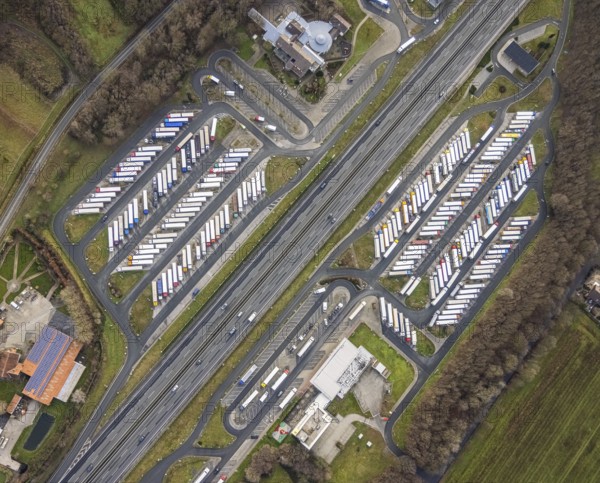 Aerial view motorway service area Rhynern-Nord and Rhynern-Süd on the A2 motorway, truck parking, Hamm, Ruhr area, North Rhine-Westphalia, Germany, A2 motorway, DE, Europe, shapes and colours, freight traffic, logistics, aerial view, aerial photograph, aerial photography, aerial photography, Rhine-Ruhr metropolitan region, parking spaces, service area, service area, transport, overview, bird's-eye view, bird's-eye view, overview