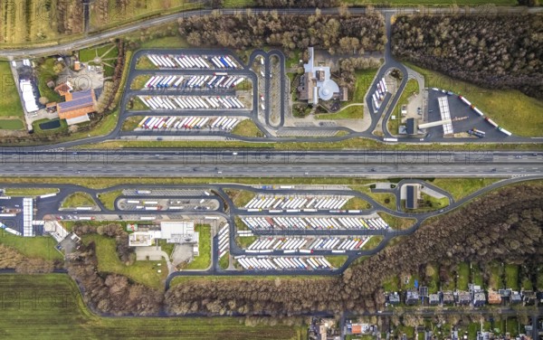 Aerial view motorway service area Rhynern-Nord and Rhynern-Süd on the A2 motorway, truck parking, Hamm, Ruhr area, North Rhine-Westphalia, Germany, A2 motorway, DE, Europe, shapes and colours, freight traffic, logistics, aerial view, aerial photograph, aerial photography, aerial photography, Rhine-Ruhr metropolitan region, parking spaces, service area, service area, transport, overview, bird's-eye view, bird's-eye view, overview