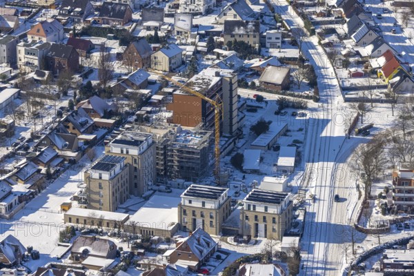 Aerial view, construction site, new building, Augenweide residential complex, condominiums and penthouses, winter, snow-covered streets and roofs, Grenzweg, Uentrop, Hamm, Ruhr area, North Rhine-Westphalia, Germany, DE, Europe, aerial view, aerial photography, aerial photography, snow, overview, bird's-eye view, view, overview, new building, residential complex, living, flat, houses, residential buildings, housing estate, settlement