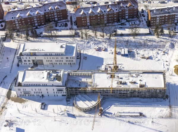 Aerial view, snow, winter, construction area Paracelsuspark with innovation centre, SCI:Q Science Quarter Hamm, former Paracelsus barracks, Bad Hamm, Hamm, Ruhr area, North Rhine-Westphalia, Germany, DE, Europe, aerial view, aerial photography, aerial photography, overview, bird's-eye view, view, overview, Science, Quarter, Techpark, university, science quarter, living, flat, houses, residential buildings, housing estate, settlement, student, university, bachelor, master, study, education, research