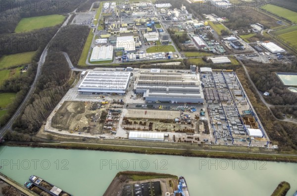 Aerial photo Goldbeck Betonelemente am Datteln-Hamm-Kanal and DuPont with DuBay Polymer GmbH in Hamm, Ruhr area, North Rhine-Westphalia, Germany, DE, Datteln-Hamm-Kanal, Europe, Frielinghauser Straße, joint venture of the LANXESS and DuPont groups, commercial enterprises, commercial area, industrial estate, industrial park, commercial location, commercial use, Hamm, industrial area, industrial building, industrial location, aerial view, aerial photography, aerial photography, aerial photography, Rhine-Ruhr metropolitan region, photovoltaics, photovoltaic system, solar, solar system, solar energy, solar energy, overview, bird's-eye view, birds-eyes view, overview