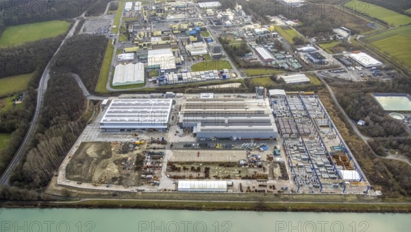 Aerial photo Goldbeck Betonelemente am Datteln-Hamm-Kanal and DuPont with DuBay Polymer GmbH in Hamm, Ruhr area, North Rhine-Westphalia, Germany, DE, Datteln-Hamm-Kanal, Europe, Frielinghauser Straße, joint venture of the LANXESS and DuPont groups, commercial enterprises, commercial area, industrial estate, industrial park, commercial location, commercial use, Hamm, industrial area, industrial building, industrial location, aerial view, aerial photography, aerial photography, aerial photography, Rhine-Ruhr metropolitan region, photovoltaics, photovoltaic system, solar, solar system, solar energy, solar energy, overview, bird's-eye view, birds-eyes view, overview