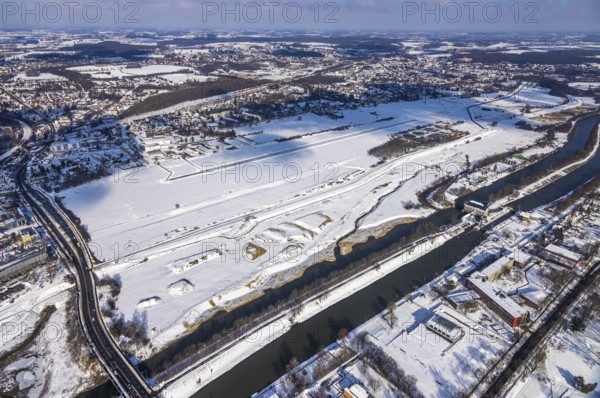 Aerial view, Hamm EDLH airfield, Lippe, Datteln-Hamm Canal, B63 Münsterstraße bridge, HTC Hockey and Tennis Club Hamm sports facility, Hammonense Gymnasium, water sports centre, snow-covered areas, winter, centre, Hamm, Ruhr area, North Rhine-Westphalia, Germany, DE, Europe, aerial view, aerial photography, aerial photography, snow, overview, bird's-eye view, birds-eyes, view, overview, Lippemäander, Hammonense, EDLH, waterway, shipping, transport, logistics, goods movement, ships, waters, education, pupils, college, training, school year, homework, class, year group, education, pedagogy, airfield, flying, air sports, leisure, pilot
