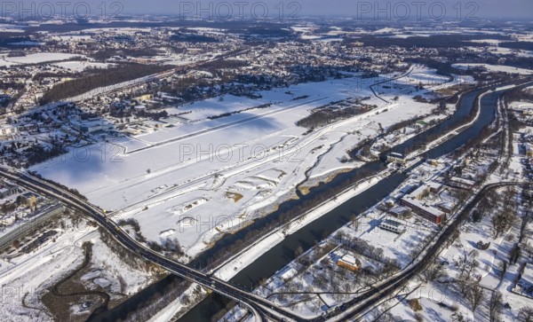 Aerial view, Hamm EDLH airfield, Lippe, Datteln-Hamm Canal, B63 Münsterstraße bridge, HTC Hockey and Tennis Club Hamm sports facility, Hammonense Gymnasium, water sports centre, snow-covered areas, winter, centre, Hamm, Ruhr area, North Rhine-Westphalia, Germany, DE, Europe, aerial view, aerial photography, aerial photography, snow, overview, bird's-eye view, birds-eyes, view, overview, Lippemäander, Hammonense, EDLH, waterway, shipping, transport, logistics, goods movement, ships, waters, education, pupils, college, training, school year, homework, class, year group, education, pedagogy, airfield, flying, air sports, leisure, pilot