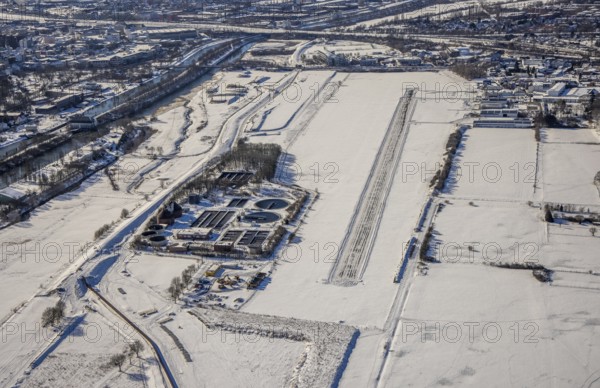 Aerial photo, EDLH airfield in the snow with cleared runway, Mattenbecke sewage treatment plant, Lippewiesen, snow, winter, Heessen, Hamm, Ruhr area, North Rhine-Westphalia, Germany, DE, Europe, aerial photo, aerial photography, aerial photography, overview, bird's-eye view, view, overview, EDLH, airfield, flying, air sports, leisure, pilot, water treatment, drinking water extraction, water purification, waste water
