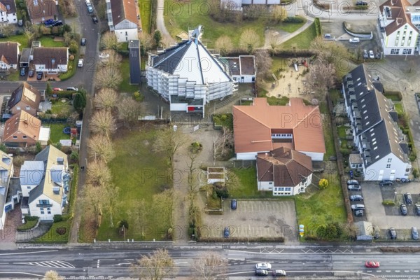 Aerial view catholic parish of St. Boniface with roof renewal of the St. Bonifatius Church in Hamm, Ruhr area, North Rhine-Westphalia, Germany, place of worship, construction work, construction project, construction site, DE, renewal, Europe, religious community, place of worship, Hamm, holy site, church, parish, denomination, aerial view, aerial photograph, aerial photography, aerial photography, metropolitan region Rhine-Ruhr, parish, religion, religious site, renovation, refurbishment, overview, bird's-eye view, birds-eyes view, overview