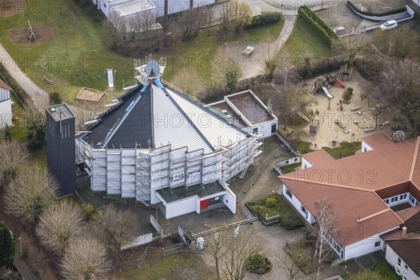 Aerial view catholic parish of St. Boniface with roof renewal of the St. Bonifatius Church in Hamm, Ruhr area, North Rhine-Westphalia, Germany, place of worship, construction work, construction project, construction site, DE, renewal, Europe, religious community, place of worship, Hamm, holy site, church, parish, denomination, aerial view, aerial photograph, aerial photography, aerial photography, metropolitan region Rhine-Ruhr, parish, religion, religious site, renovation, refurbishment, overview, bird's-eye view, birds-eyes view, overview