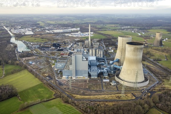 Aerial view of the RWE Westfalen power plant in Uentrop in Hamm, Ruhr area, North Rhine-Westphalia, Germany, DE, Europe, distant view, shapes and colours, Hamm, coal-fired power plant, cooling towers, aerial view, aerial photograph, aerial photography, aerial photography, Rhine-Ruhr metropolitan region, tower, overview, bird's-eye view, twin towers, birds-eyes view, overview